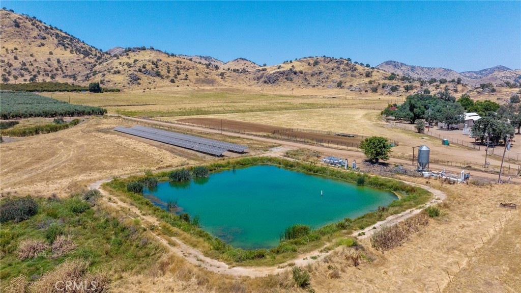 19400 398th Woodlake, CA 93286 - Photo 41 of 51 a view of a lake with mountains in the background