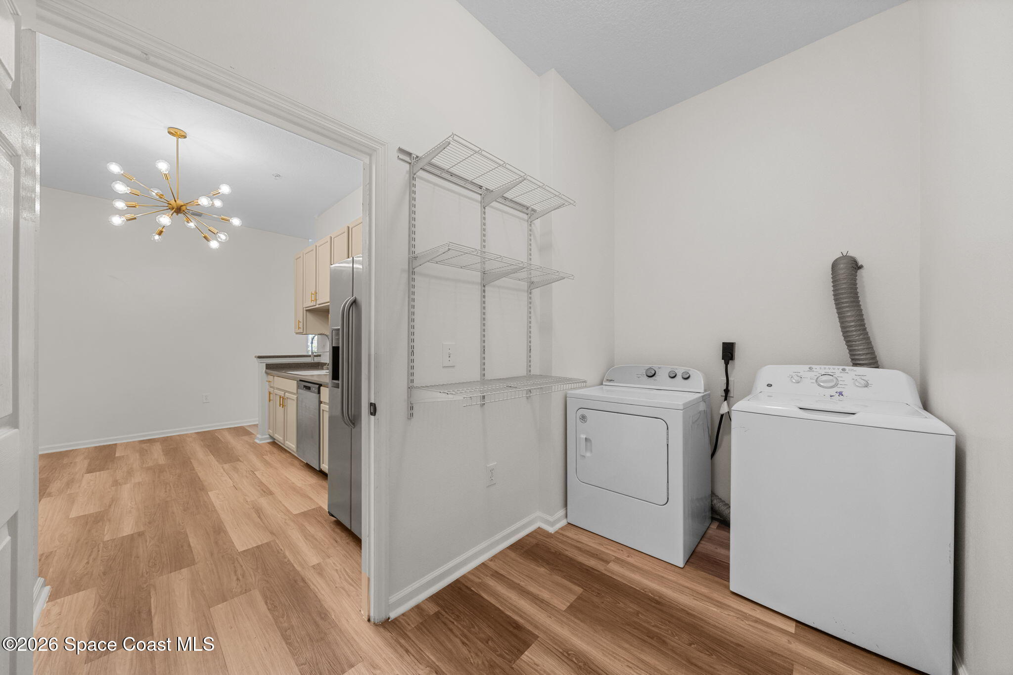 4056 Meander Place, Unit 104 Rockledge, FL 32955 - Photo 14 of 25 a view of utility room with washer and dryer