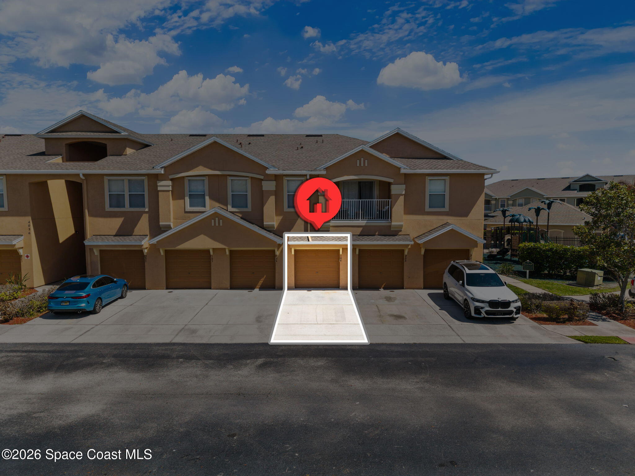 4056 Meander Place, Unit 104 Rockledge, FL 32955 - Photo 19 of 25 a front view of a house with parking