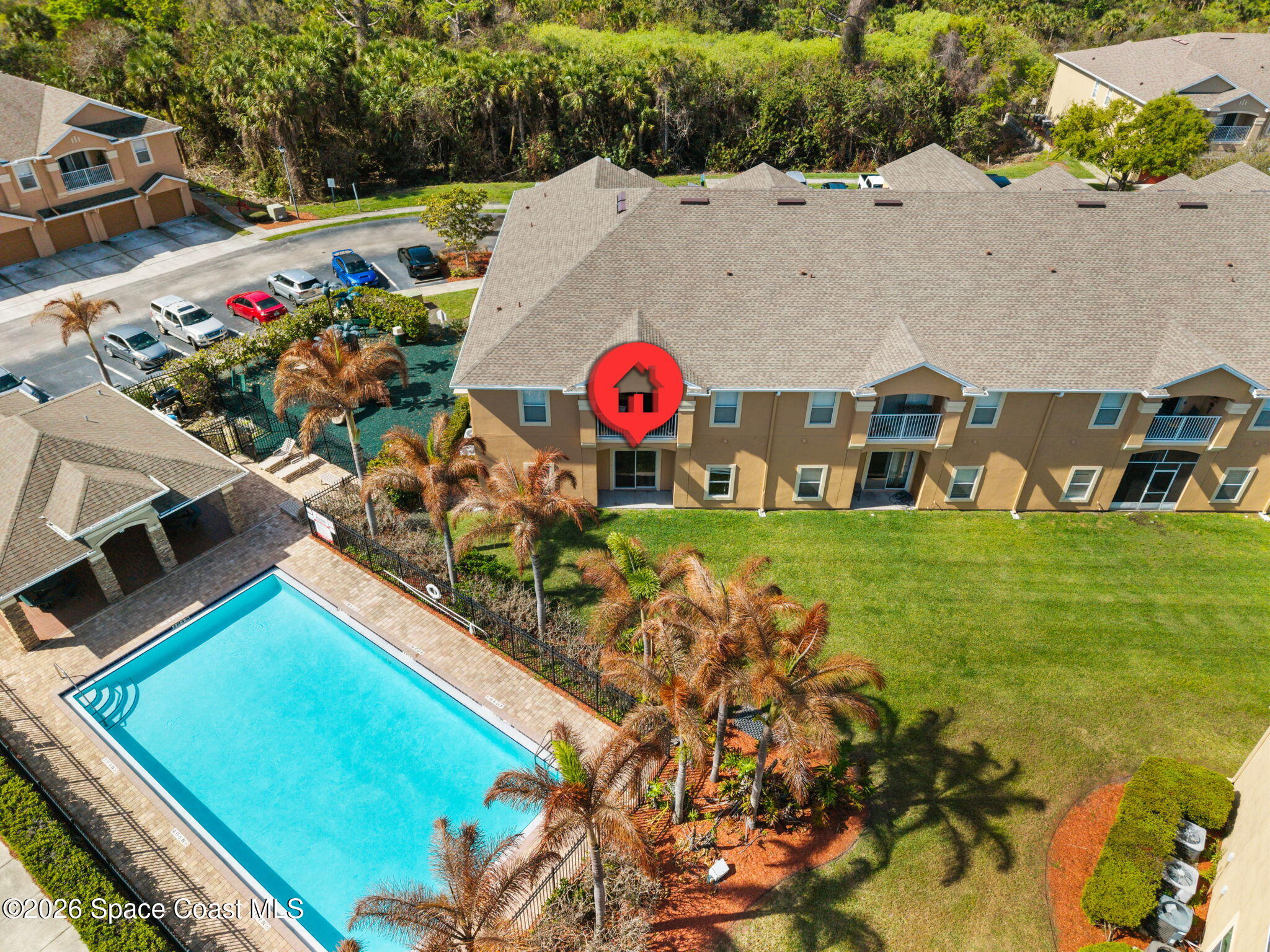 4056 Meander Place, Unit 104 Rockledge, FL 32955 - Photo 20 of 25 an aerial view of swimming pool patio and mountain view in back