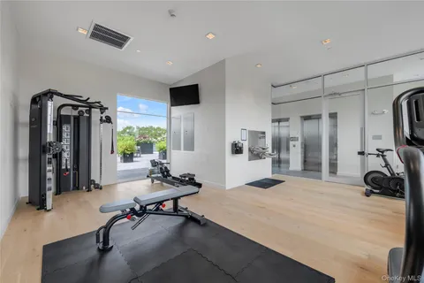 a view of a room with gym equipment