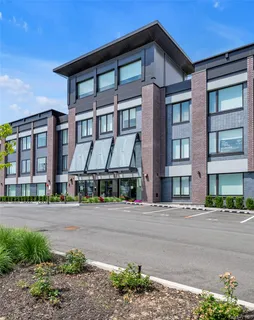 a front view of a building and a street
