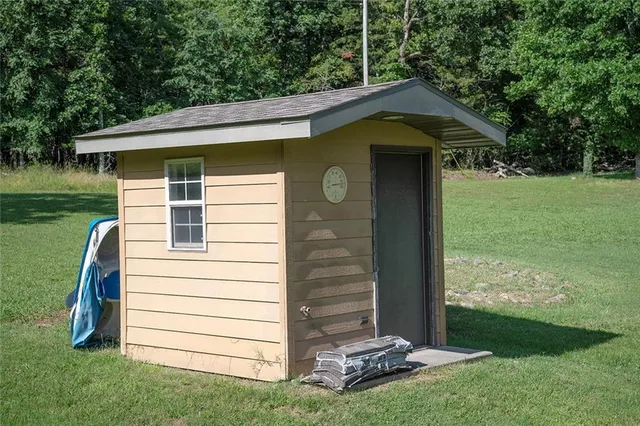 $695,000 | 1318 Oakwood Drive, Hollister, MO 65672