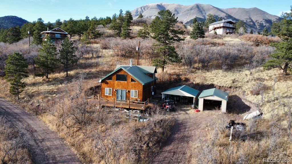 10401 Windy Ridge Road Aguilar, CO 81020 - Photo 2 of 24 an aerial view of a house with a yard