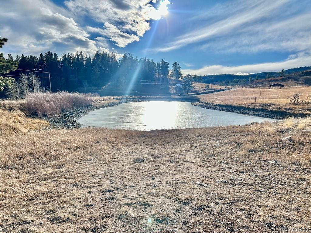 10401 Windy Ridge Road Aguilar, CO 81020 - Photo 21 of 24 a view of a dry yard with wooden fence