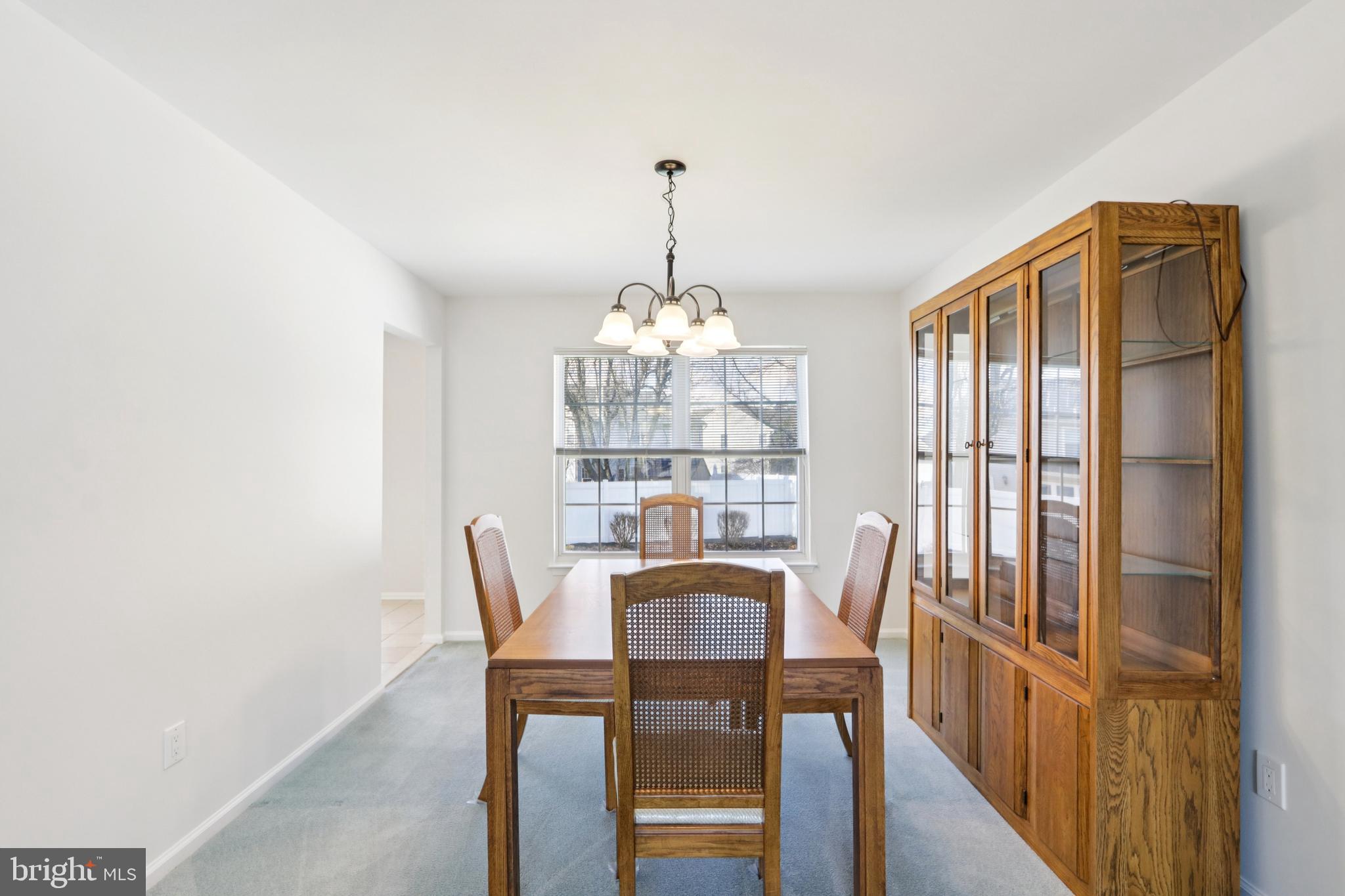 58 Watson Drive Mount Laurel, NJ 08054 - Photo 13 of 56 a view of a dining room with furniture wooden floor and chandelier