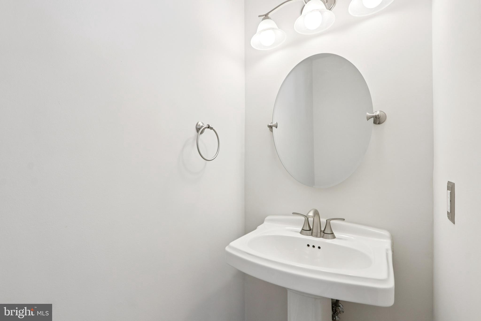 58 Watson Drive Mount Laurel, NJ 08054 - Photo 19 of 56 a bathroom with a sink and mirror