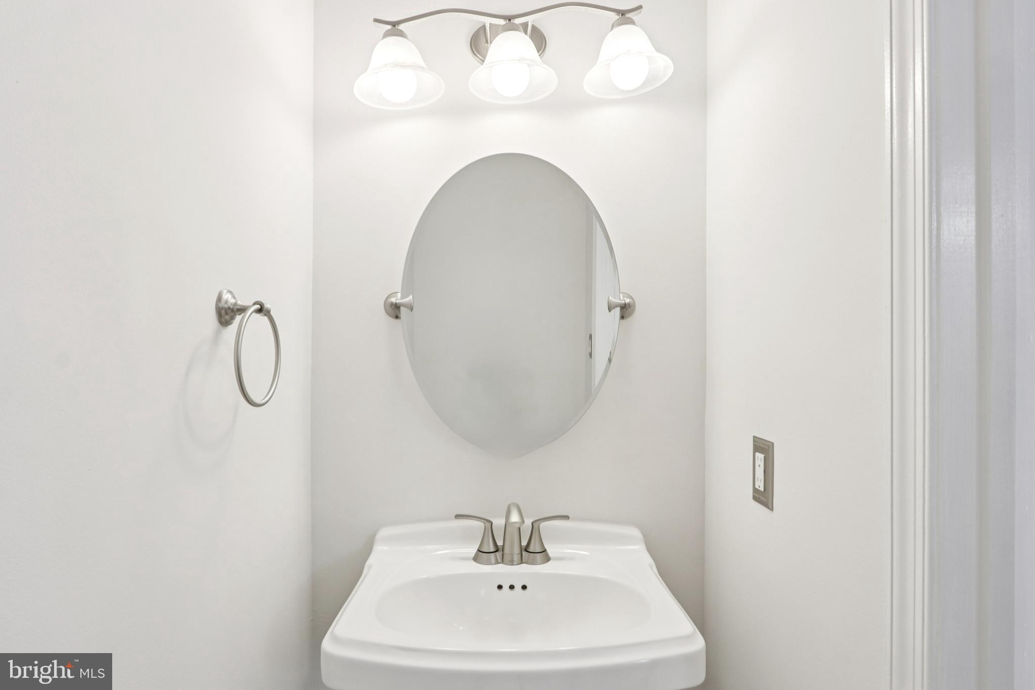 58 Watson Drive Mount Laurel, NJ 08054 - Photo 20 of 56 a bathroom with a sink a mirror and vanity