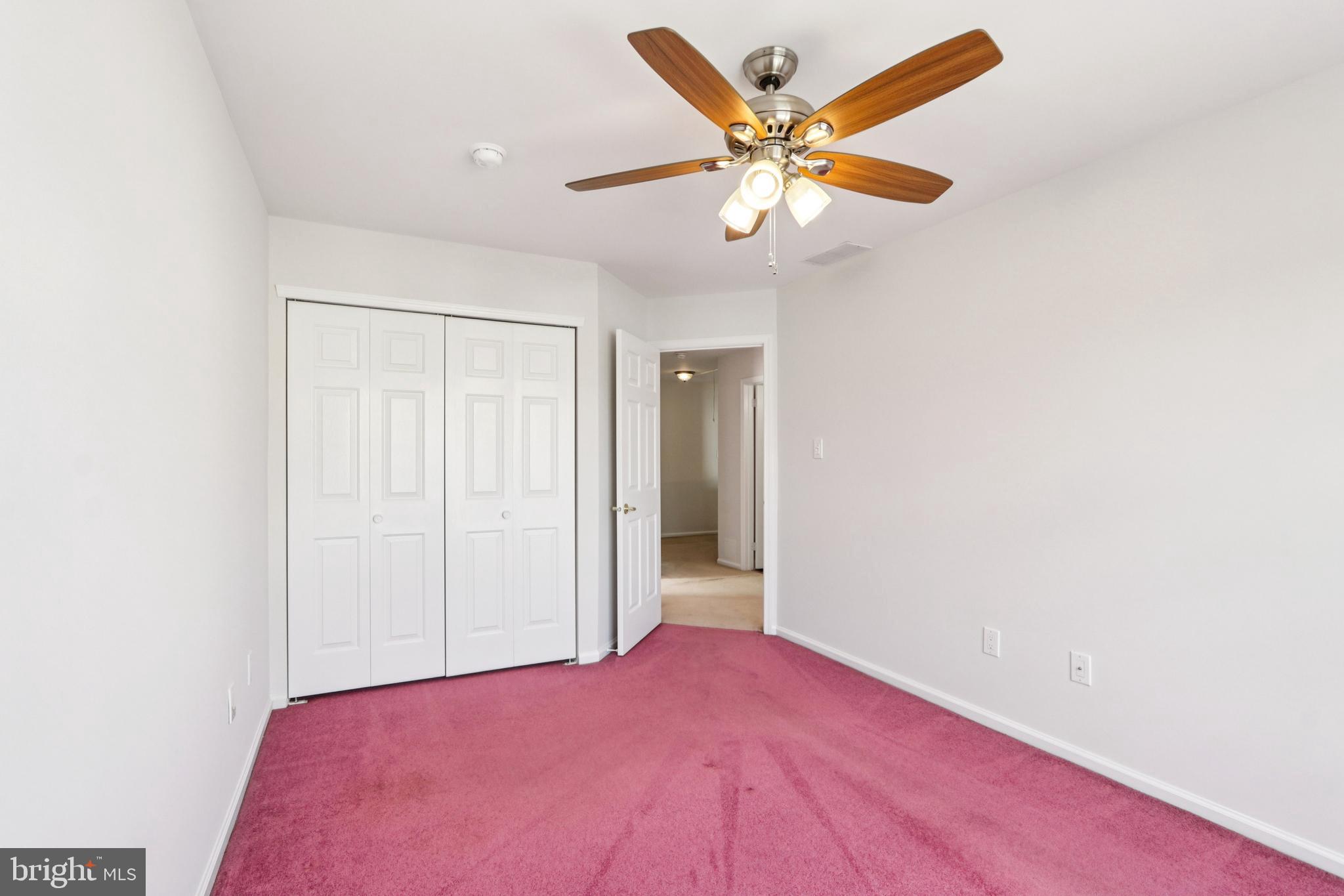 58 Watson Drive Mount Laurel, NJ 08054 - Photo 26 of 56 an empty room with a window and a ceiling fan
