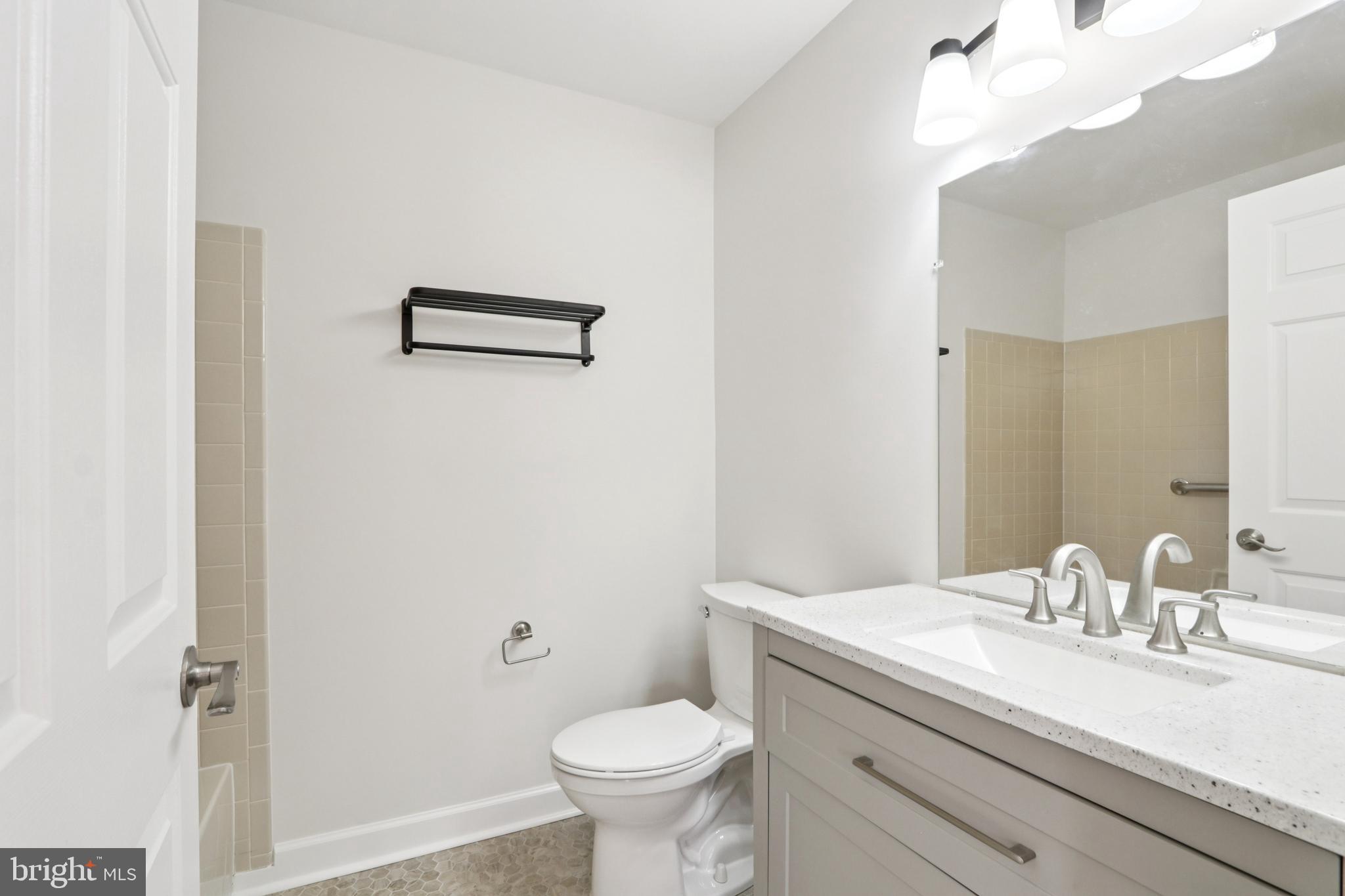 58 Watson Drive Mount Laurel, NJ 08054 - Photo 29 of 56 a bathroom with a granite countertop sink mirror and toilet
