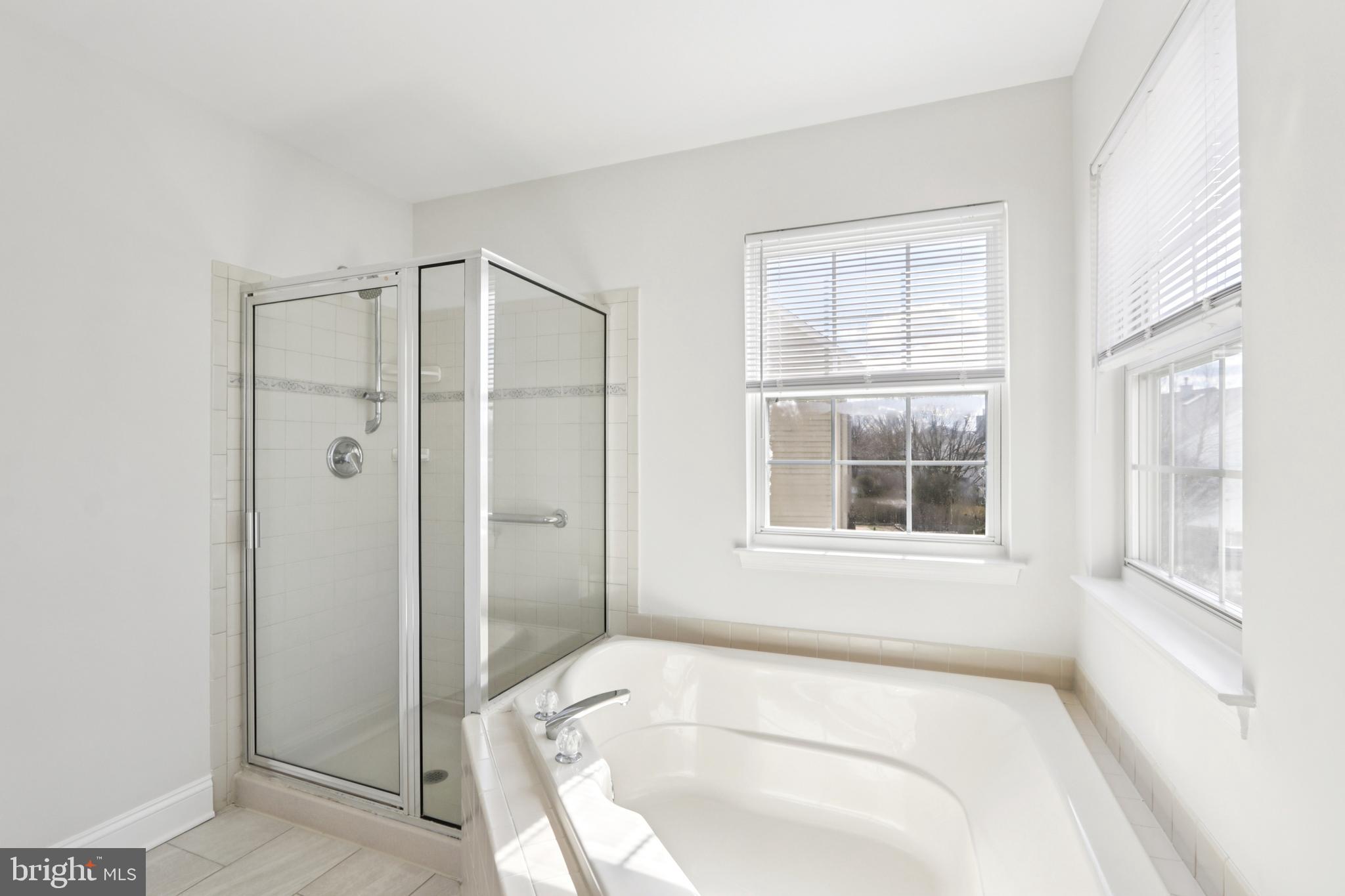 58 Watson Drive Mount Laurel, NJ 08054 - Photo 38 of 56 a bathroom with a bathtub and shower