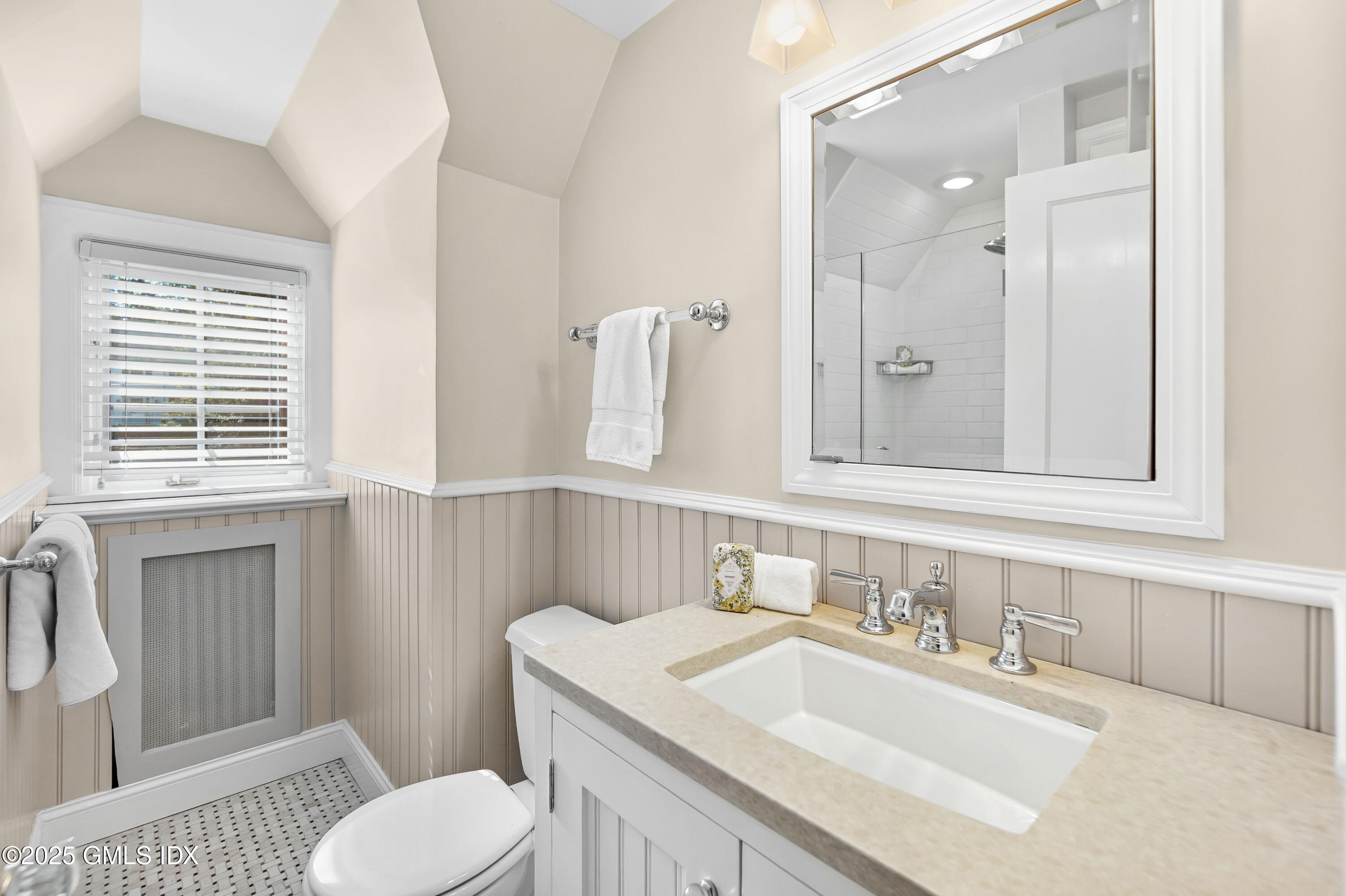 87 Orchard Drive Greenwich, CT 06830 - Photo 22 of 31 a bathroom with a sink toilet vanity and tub