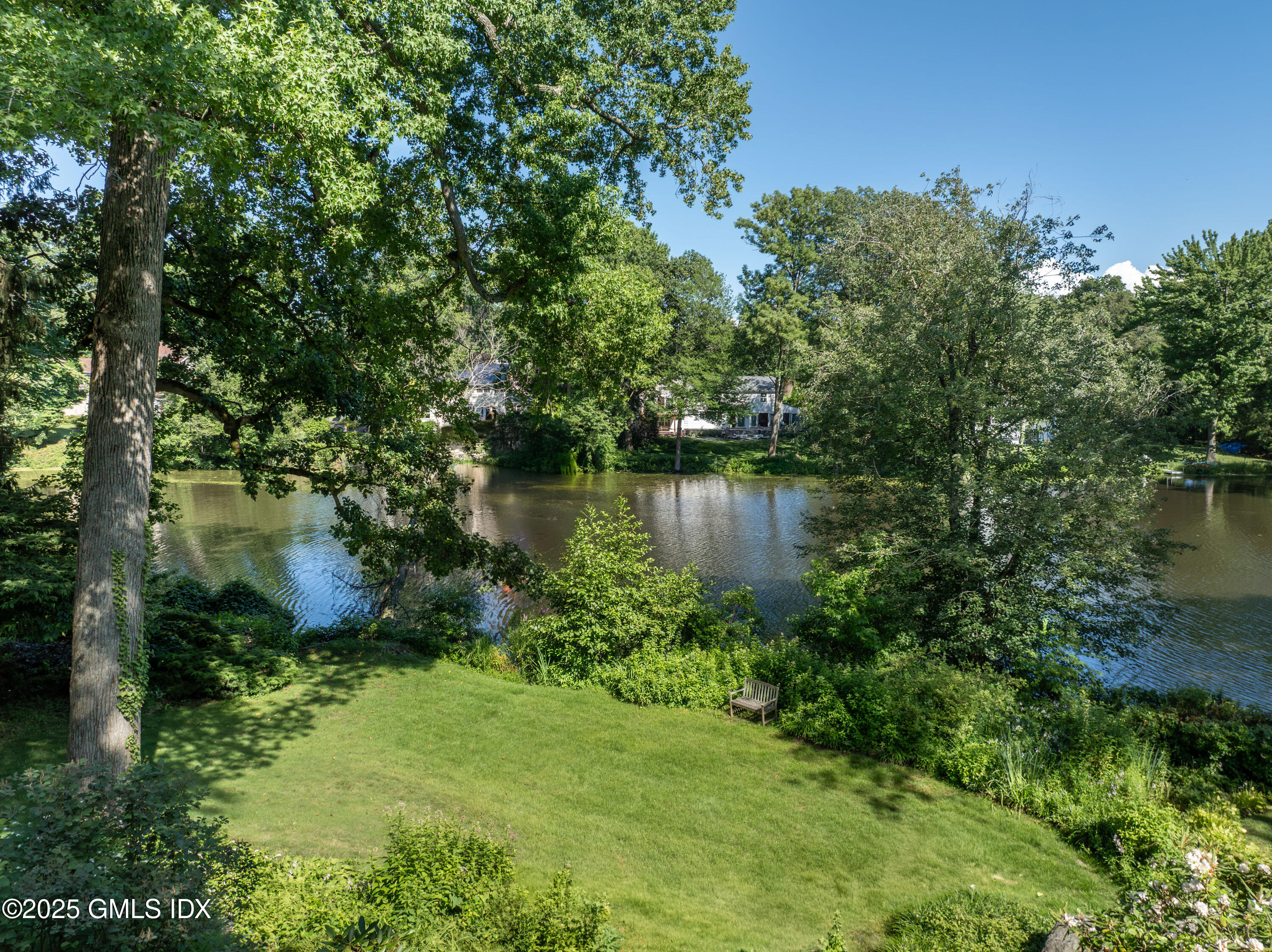 87 Orchard Drive Greenwich, CT 06830 - Photo 26 of 31 an aerial view of a house with a yard