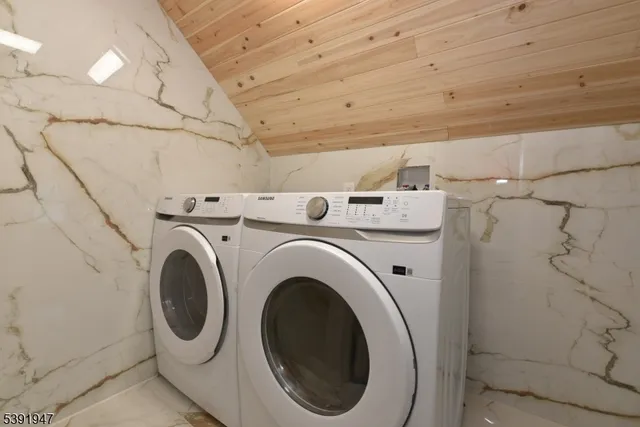 a view of balcony with wooden floor