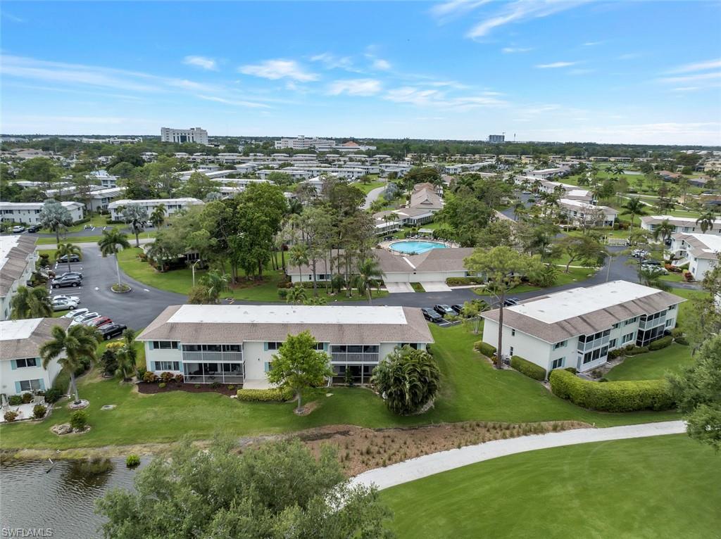 245 Quails Nest Road, Unit 3 Naples, FL 34112 - Photo 36 of 50 an aerial view of a house with a garden