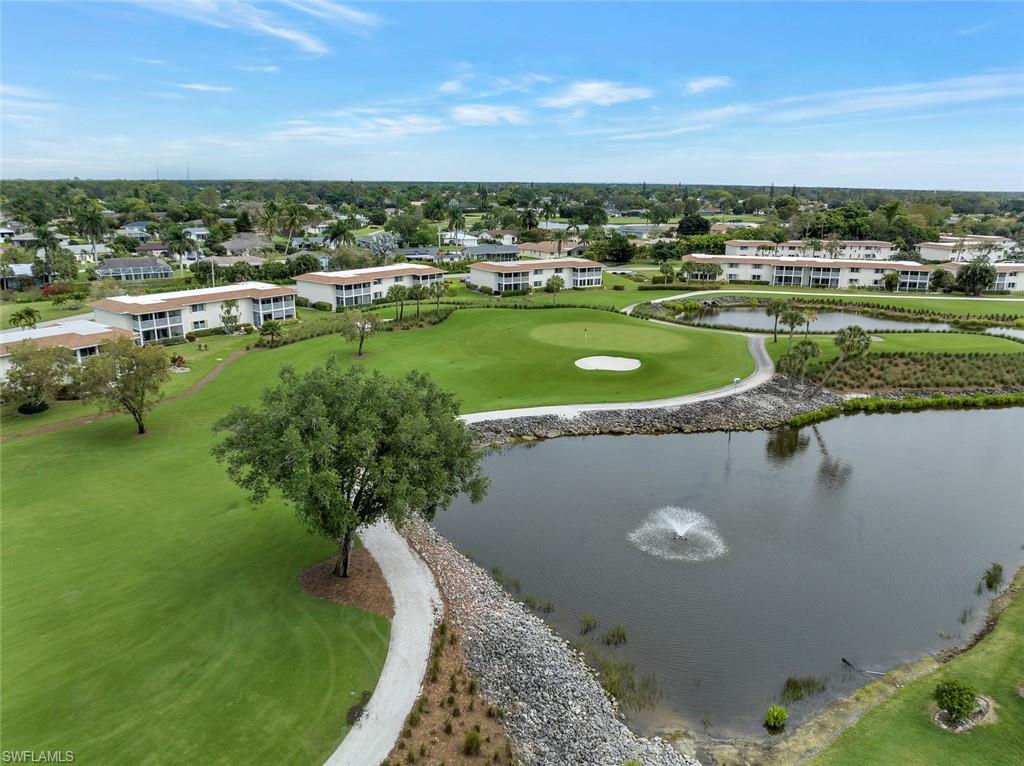 245 Quails Nest Road, Unit 3 Naples, FL 34112 - Photo 41 of 50 a view of a lake with a city