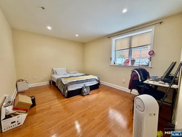 a living room with a couch and a window