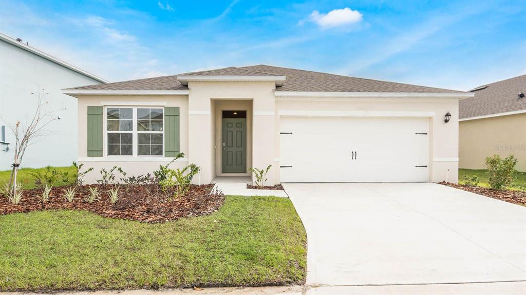 976 Fawn Grace Road Umatilla, FL 32784 - Photo 1 of 1 a front view of a house with a yard