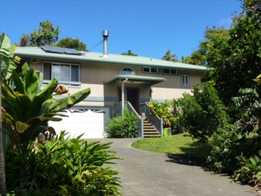82-1225 Kinue Road Captain Cook, HI 96704 - Photo 2 of 25 a front view of a house with garden