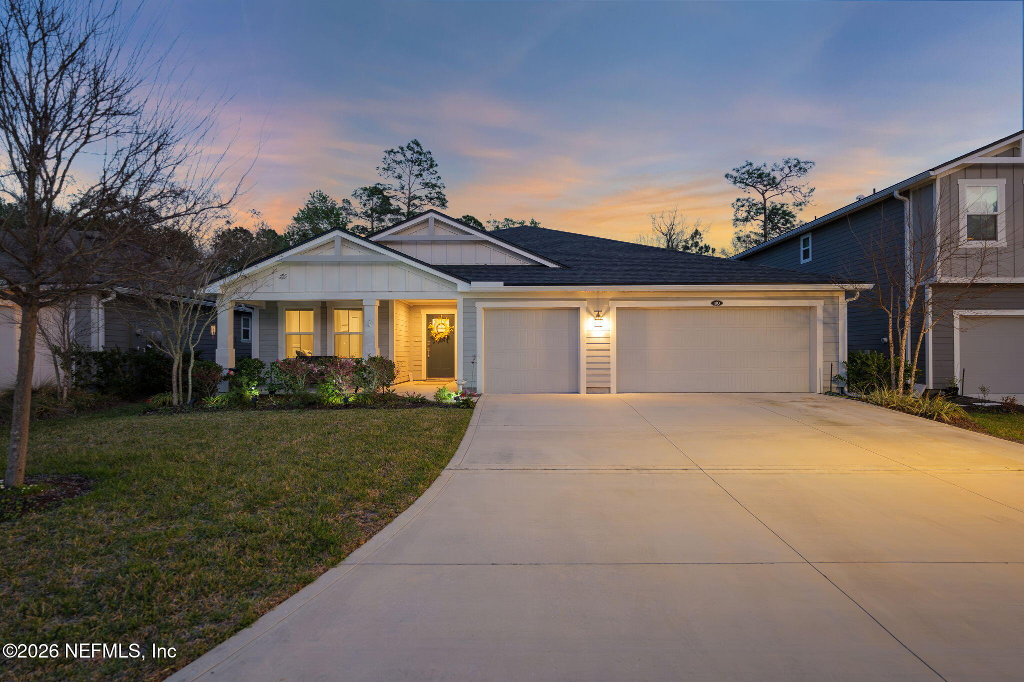 103 Riva Ridge Place St. Johns, FL 32259 - Photo 1 of 77 a front view of a house with a yard