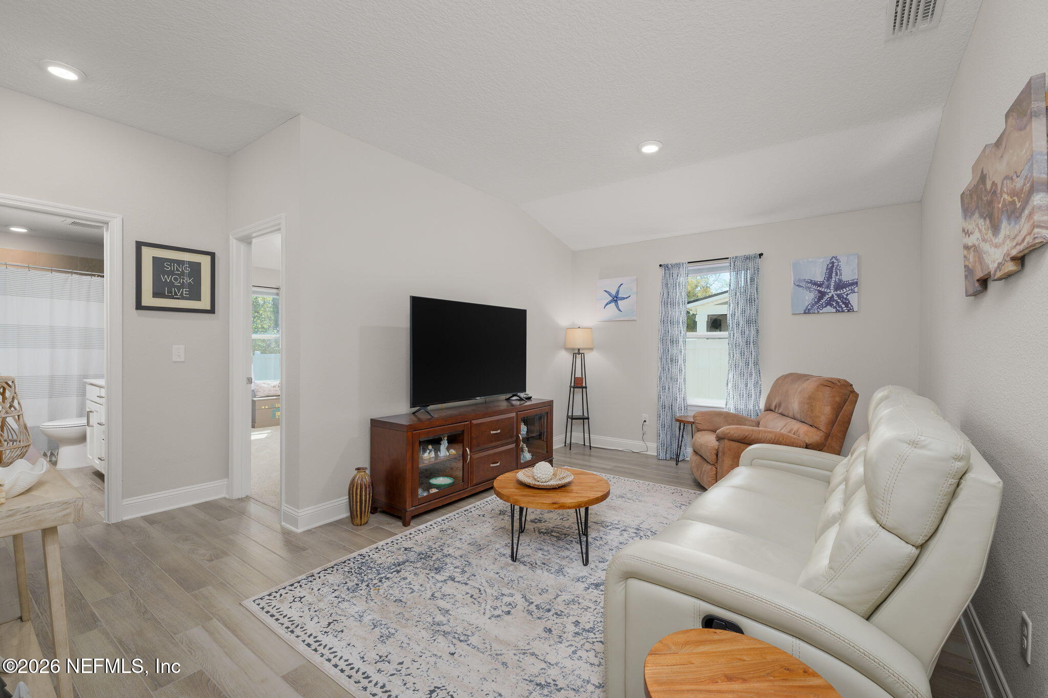 103 Riva Ridge Place St. Johns, FL 32259 - Photo 21 of 77 a living room with furniture and a flat screen tv