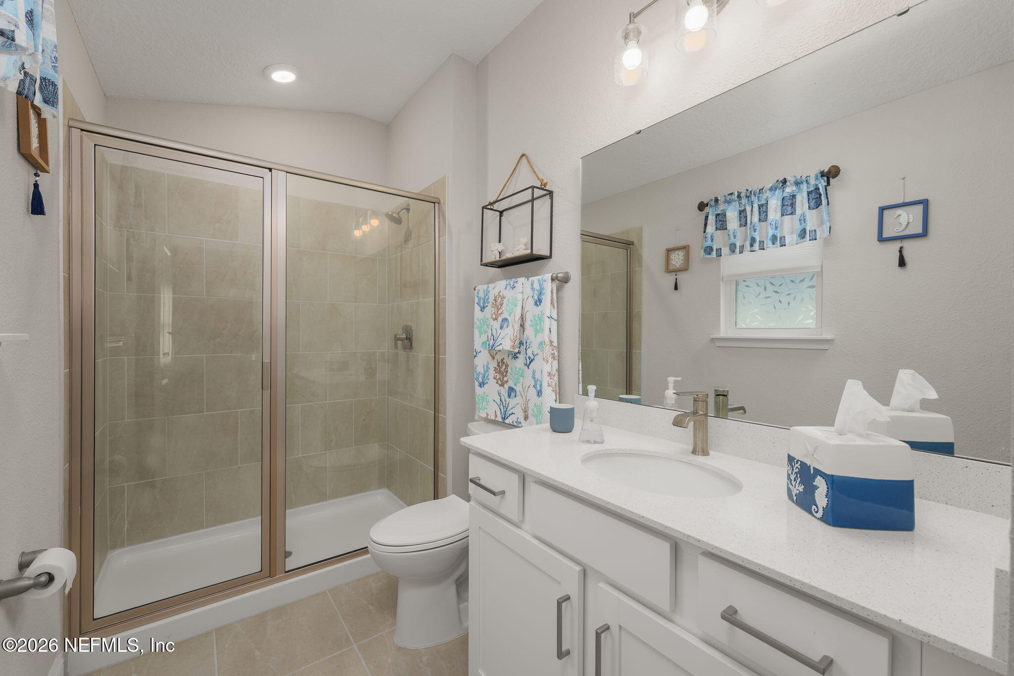 103 Riva Ridge Place St. Johns, FL 32259 - Photo 22 of 77 a bathroom with a sink a toilet and shower