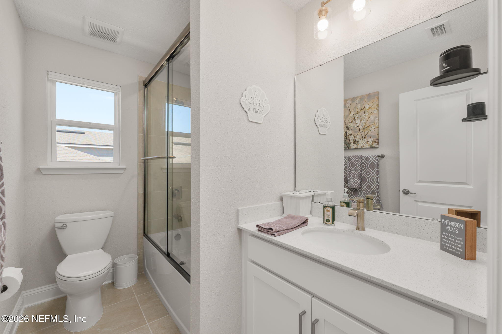 103 Riva Ridge Place St. Johns, FL 32259 - Photo 31 of 77 a bathroom with a sink toilet and shower
