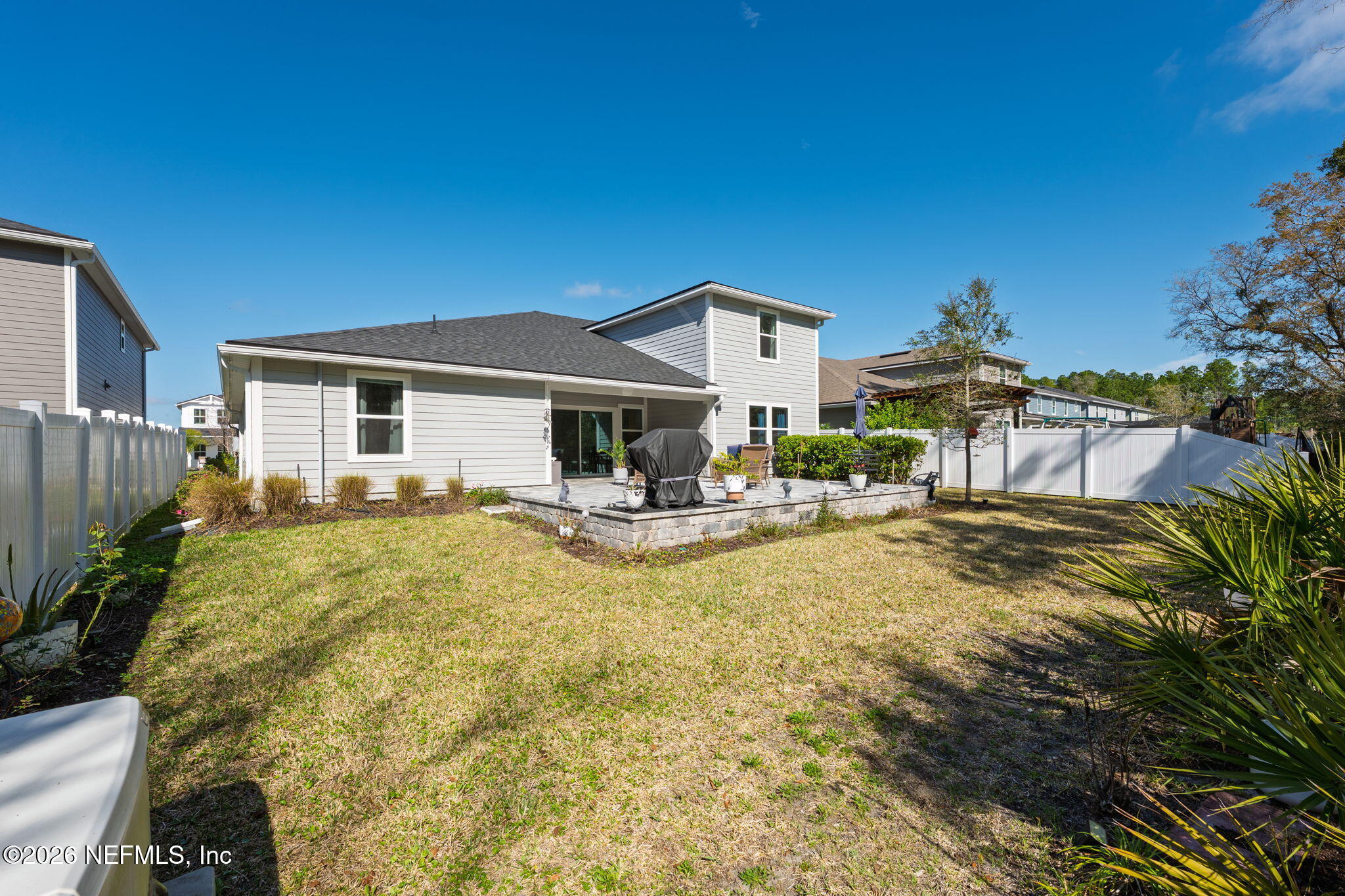 103 Riva Ridge Place St. Johns, FL 32259 - Photo 40 of 77 a view of a house with pool and chairs