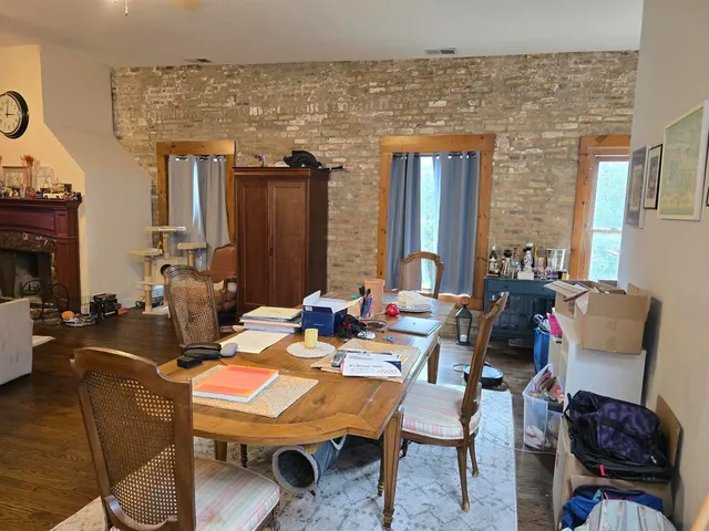 a view of a dining room with furniture