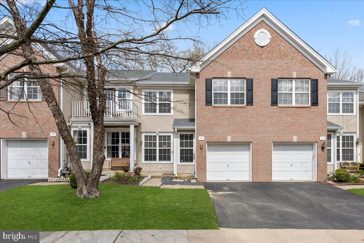 111 Windsor Pond Road Princeton Junction, NJ 08550 - Photo 1 of 29 a front view of a house with a yard