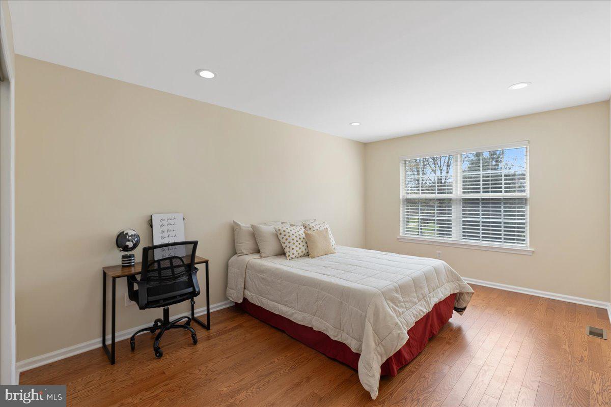 111 Windsor Pond Road Princeton Junction, NJ 08550 - Photo 12 of 29 a bedroom with a bed and a window