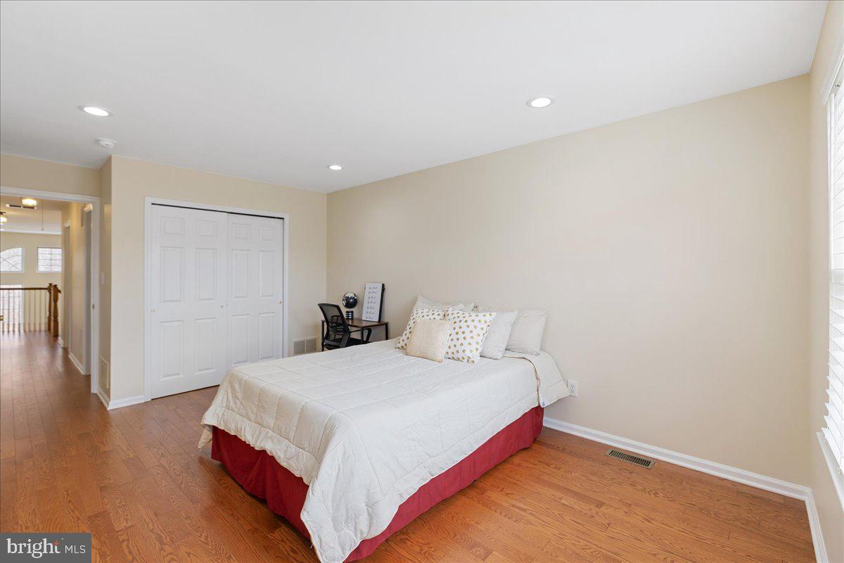 111 Windsor Pond Road Princeton Junction, NJ 08550 - Photo 13 of 29 a bedroom with a bed and a table