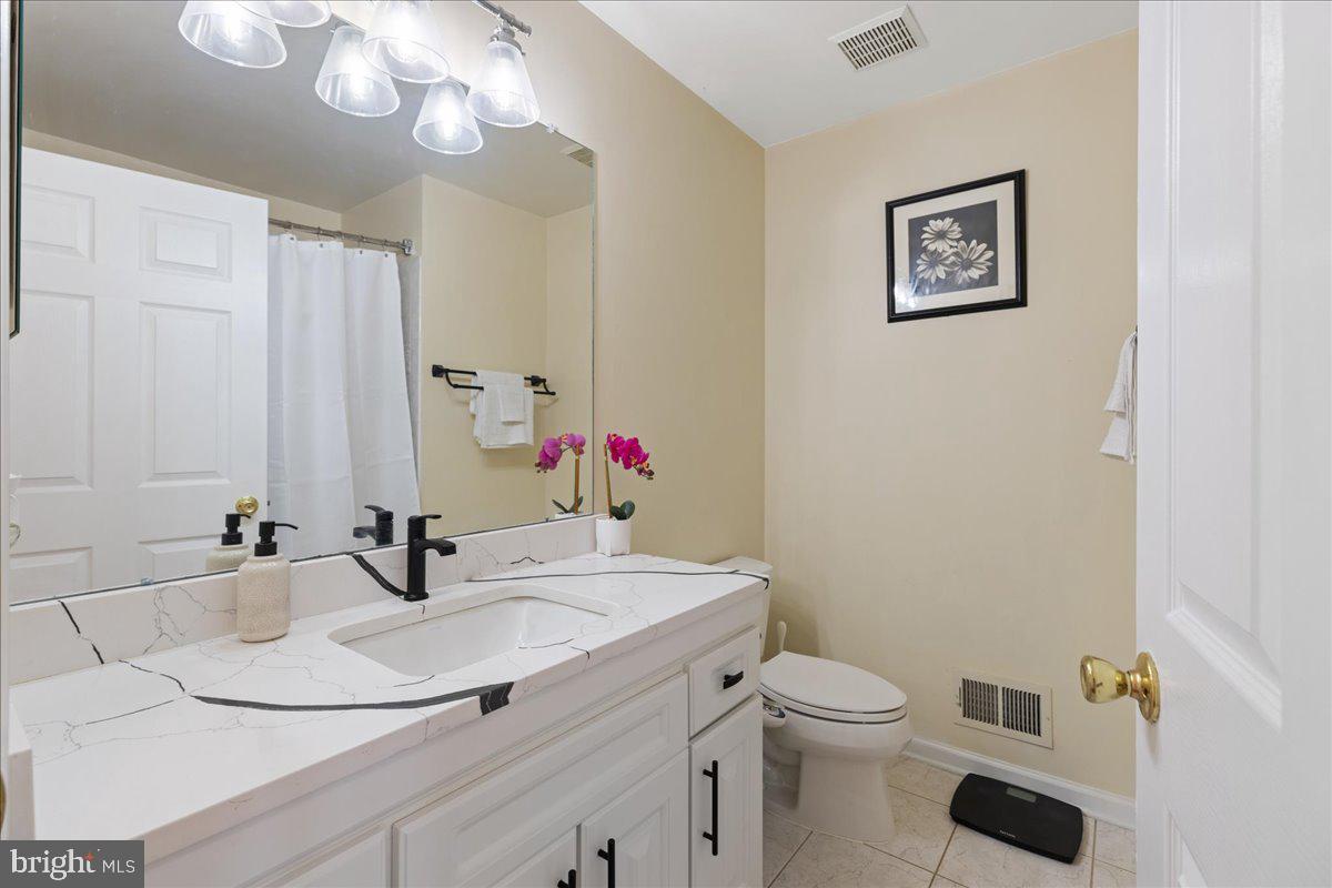 111 Windsor Pond Road Princeton Junction, NJ 08550 - Photo 14 of 29 a bathroom with a sink and a mirror