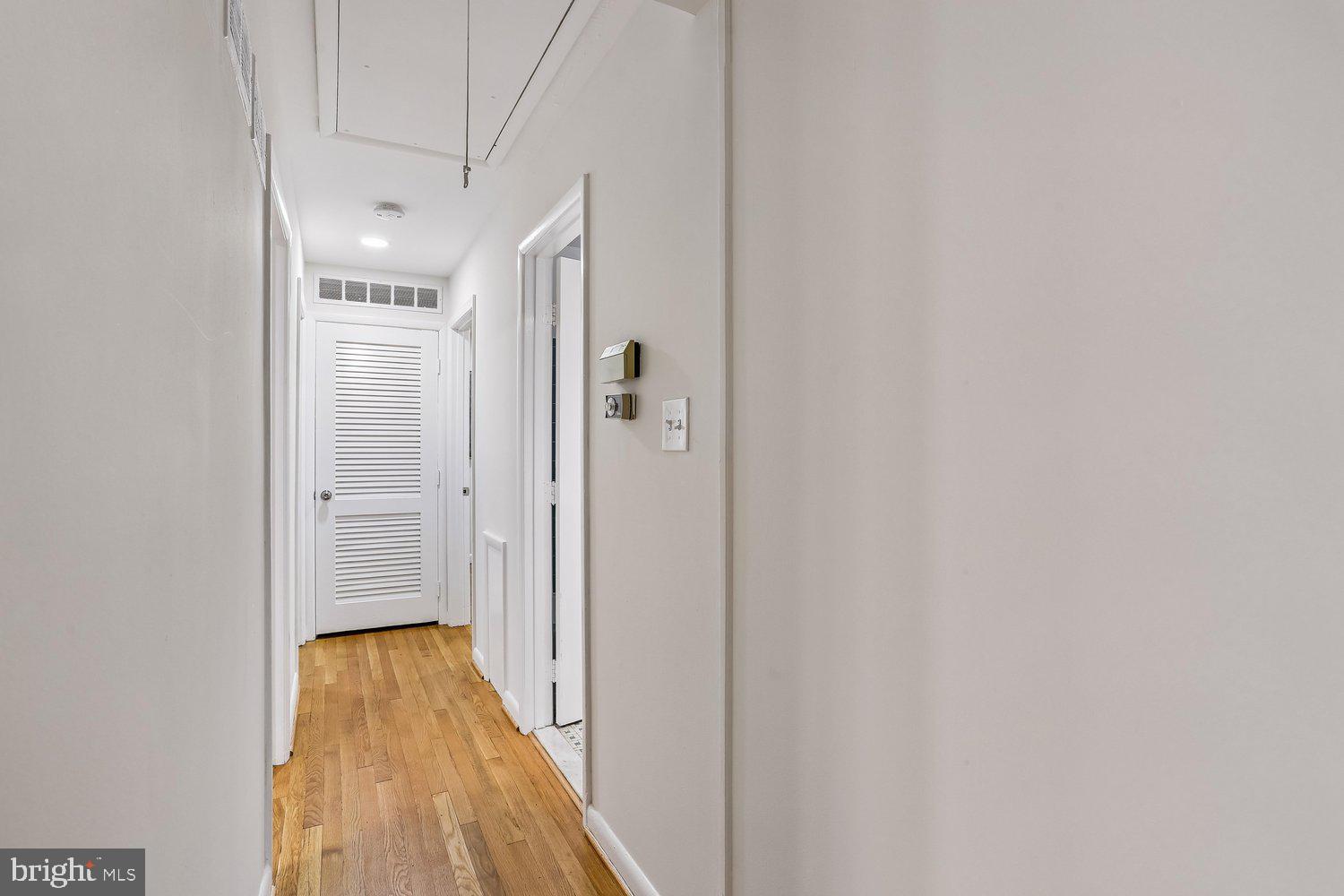 907 Hoyt Street Silver Spring, MD 20902 - Photo 24 of 69 a view of a hallway with wooden floor