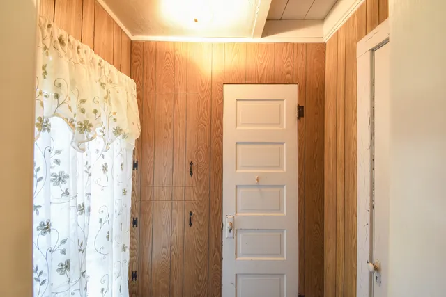 a bathroom with a shower curtain