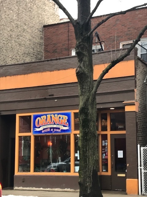 2011 West Roscoe Street Chicago, IL 60618 - Photo 8 of 8 a sign that is on the side of a building