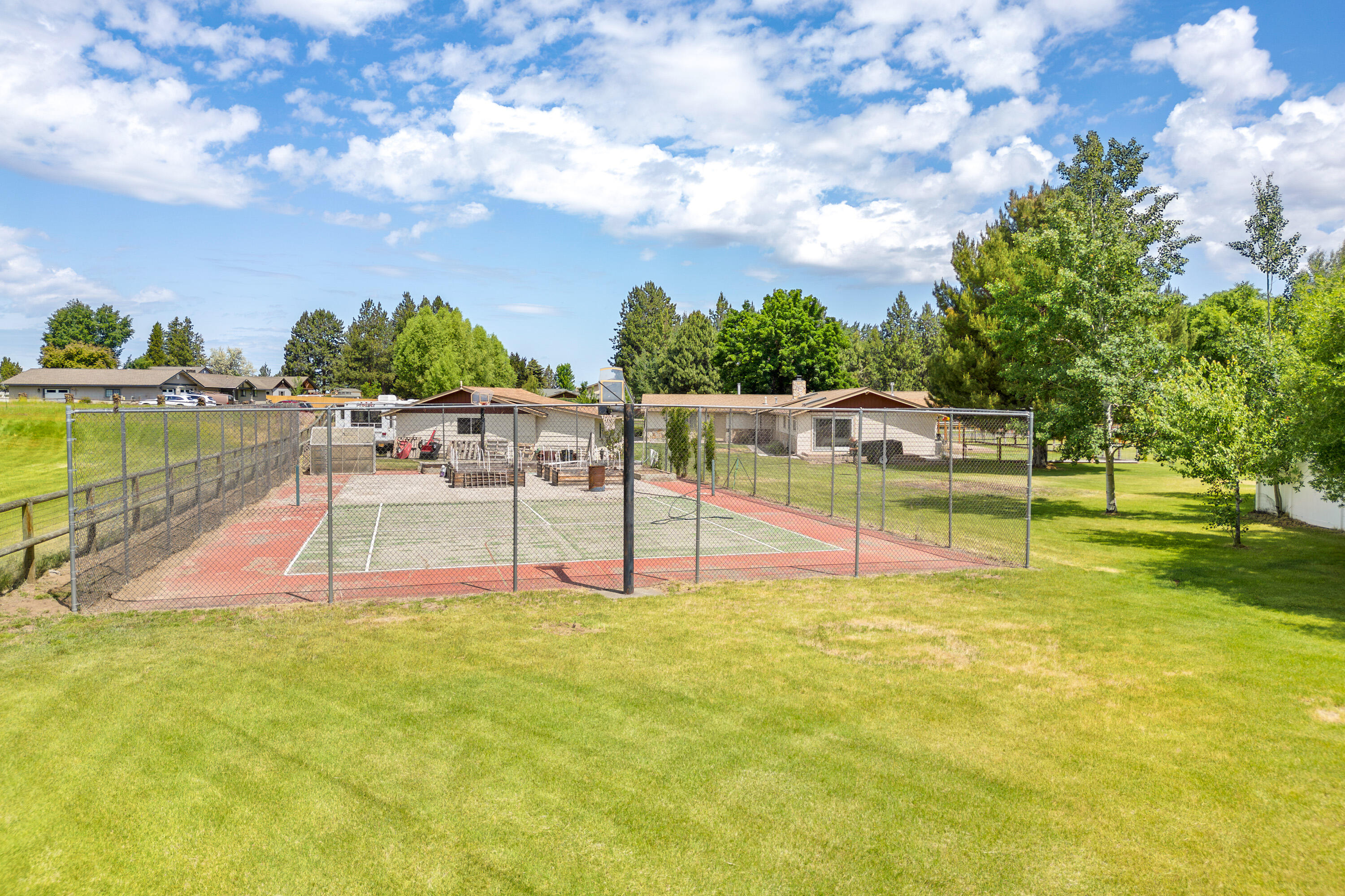 21697 Old Red Road Bend, OR 97702 - Photo 46 of 50 Tennis court that can be resurfaced or turned into pickleball courts if you choose.