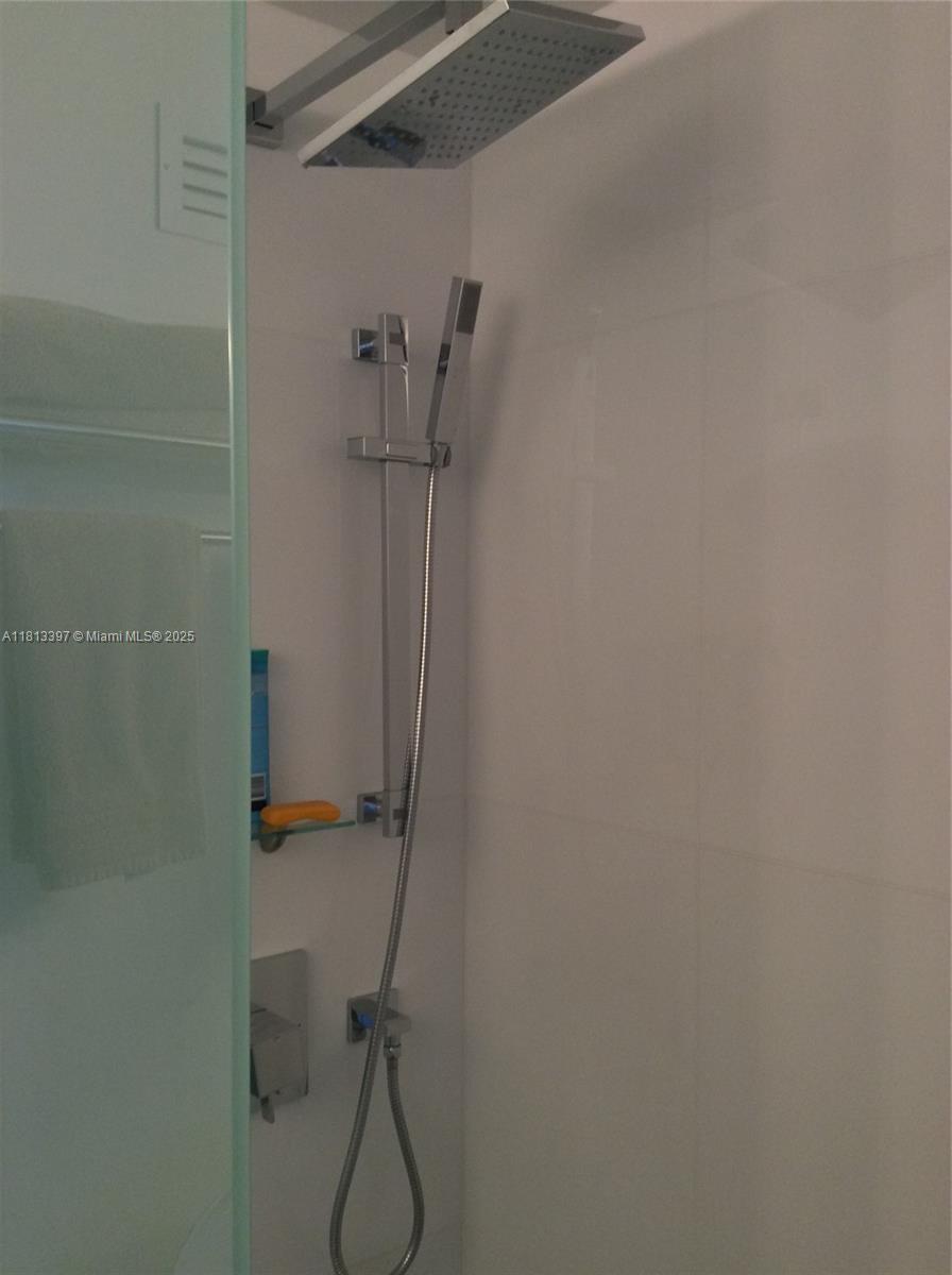 100 Lincoln Road, Unit 1214 Miami Beach, FL 33139 - Photo 15 of 17 a bathroom with a shower