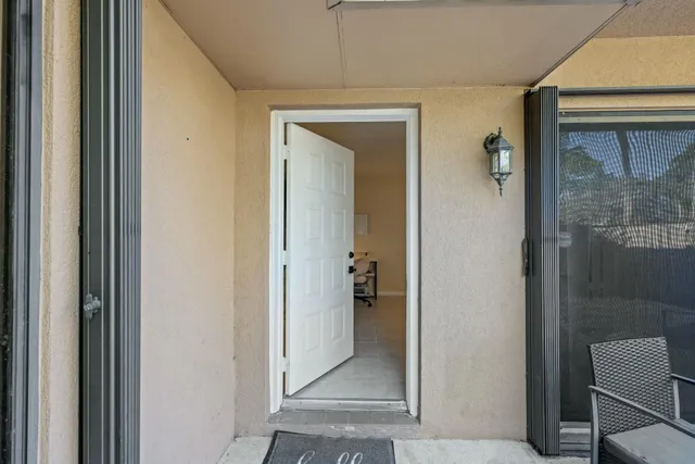 a view of a livingroom from a hallway