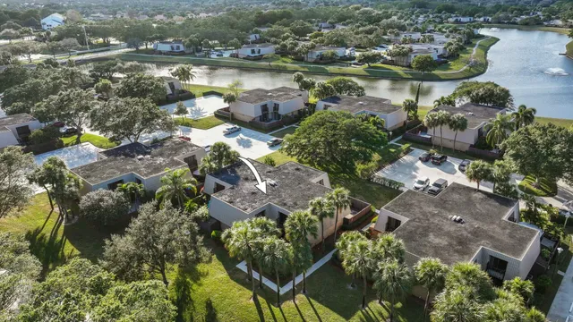an aerial view of a houses with outdoor space