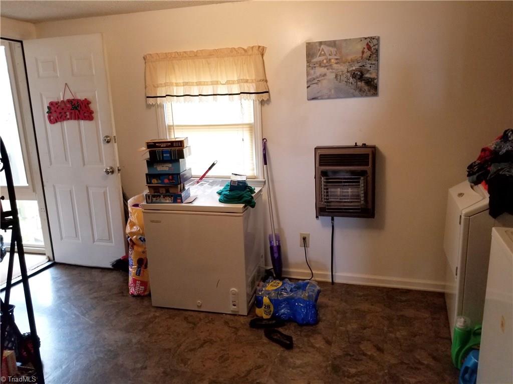5814 Little Beane Store Road Seagrove, NC 27341 - Photo 7 of 19 Spacious Laundry Room - Wall heater does not remain