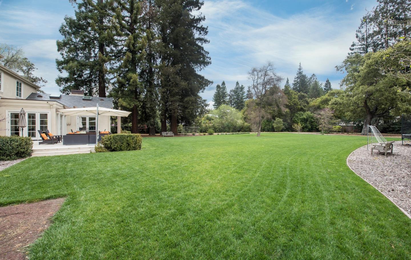 1340 Arbor Road Menlo Park, CA 94025 - Photo 2 of 7 a view of a house with a big yard potted plants and large tree
