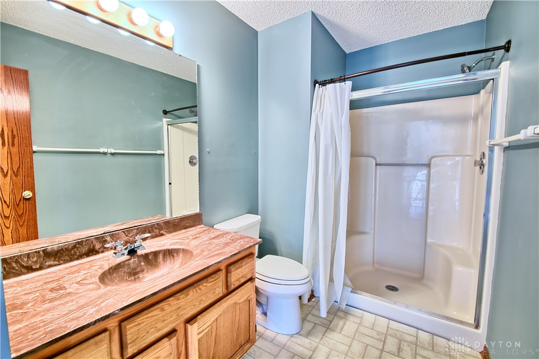8711 Nicole Lane Springboro, OH 45066 - Photo 59 of 87 This bright bathroom features a spacious shower and a vanity with ample counter space.