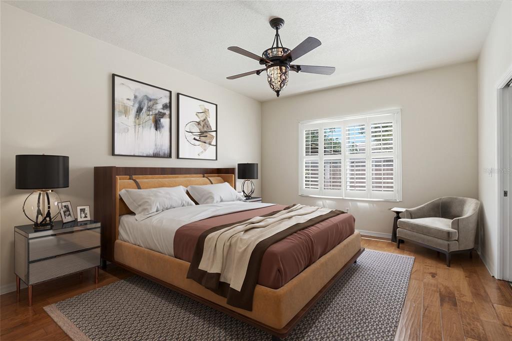 1934 Old Sawmill Road Brandon, FL 33510 - Photo 20 of 40 a bedroom with a bed and a couch