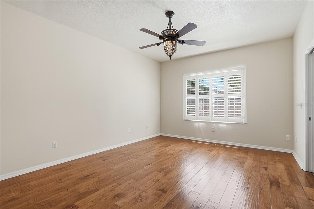 1934 Old Sawmill Road Brandon, FL 33510 - Photo 21 of 40 a view of a room with wooden floor and windows