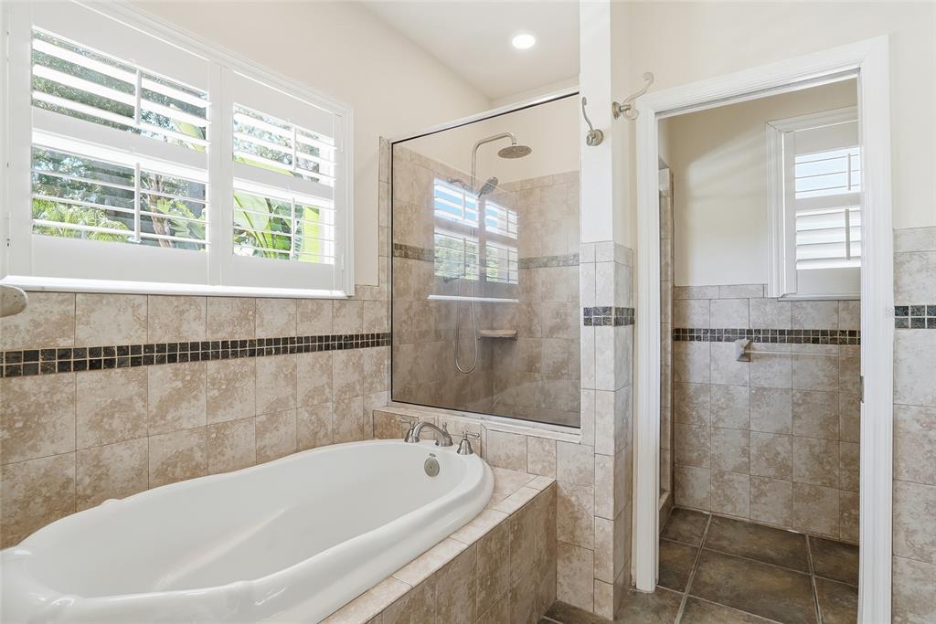 1934 Old Sawmill Road Brandon, FL 33510 - Photo 25 of 40 a bathroom with a bathtub and shower