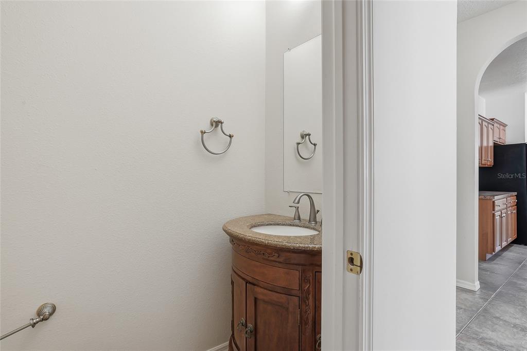 1934 Old Sawmill Road Brandon, FL 33510 - Photo 28 of 40 a bathroom with a sink and vanity