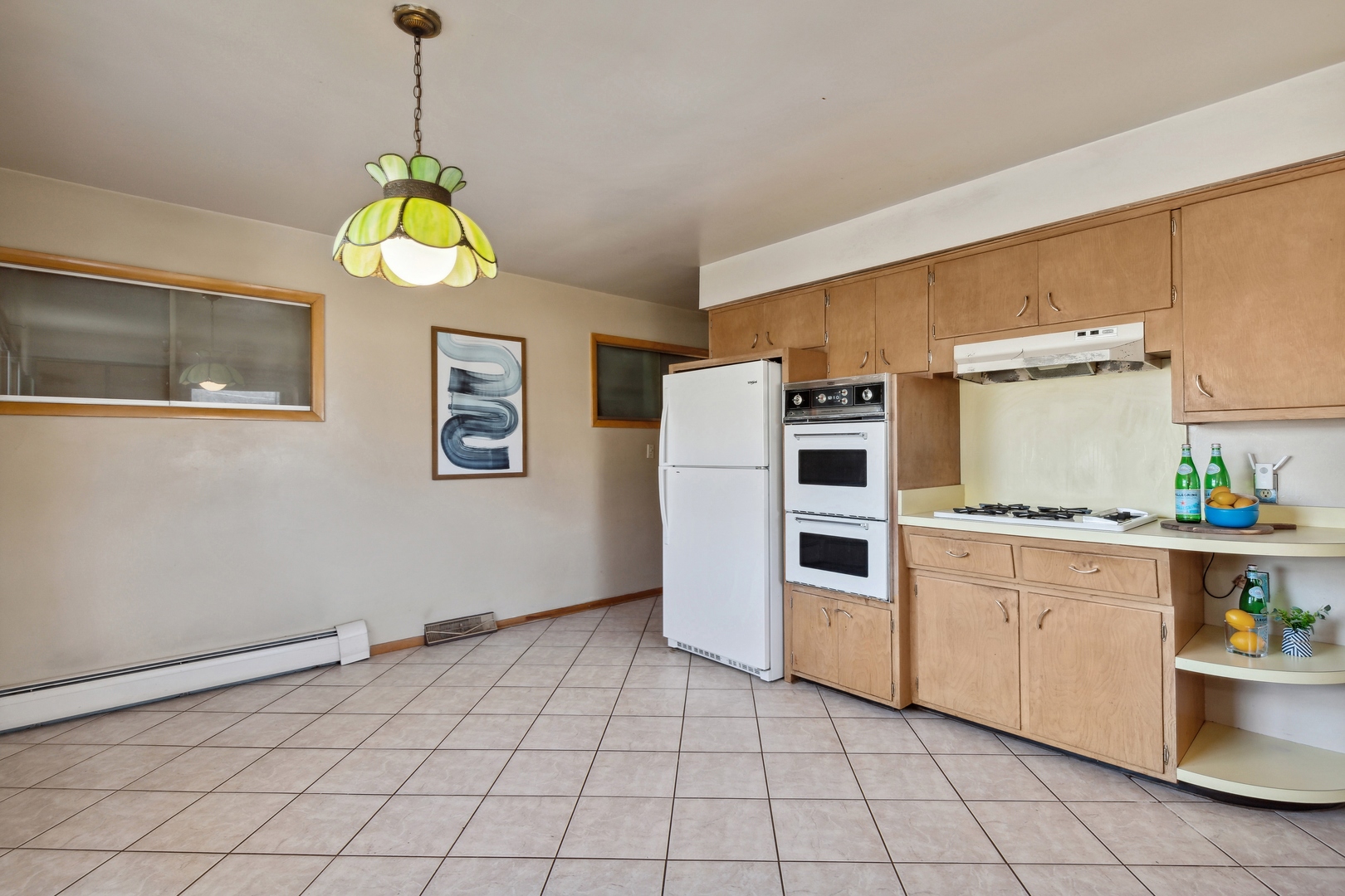 26075 Riverview Drive Antioch, IL 60002 - Photo 13 of 41 a kitchen with stainless steel appliances granite countertop a stove a sink and a refrigerator