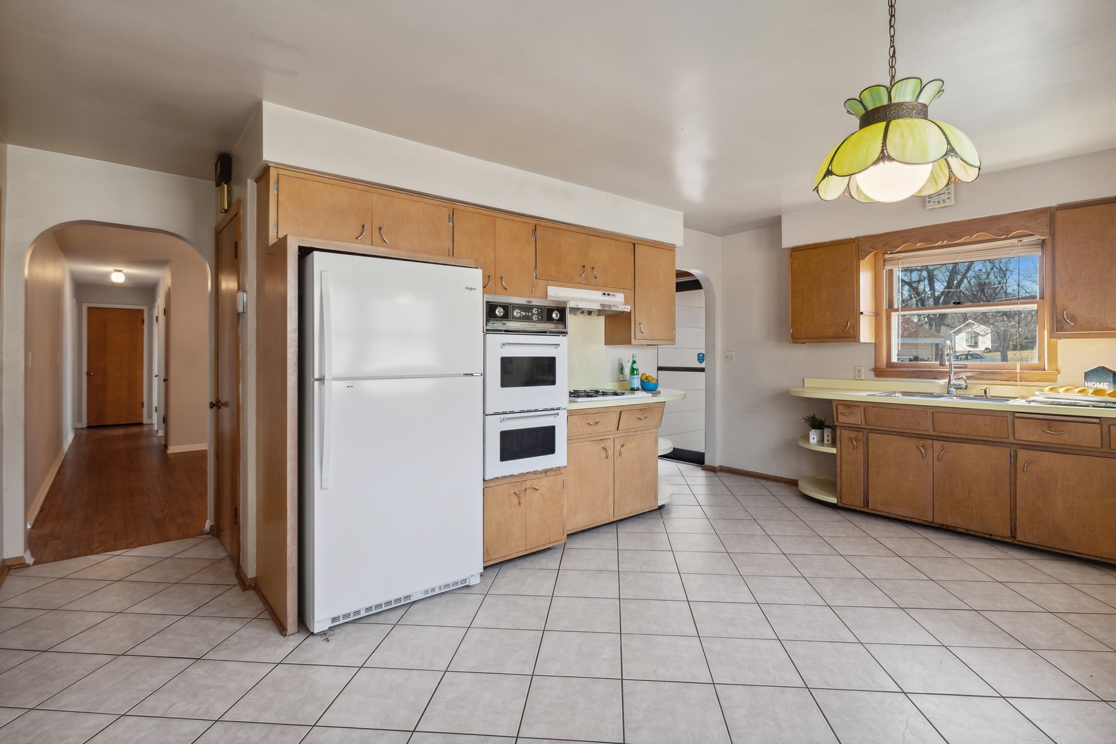 26075 Riverview Drive Antioch, IL 60002 - Photo 14 of 41 a kitchen with stainless steel appliances a refrigerator and a stove