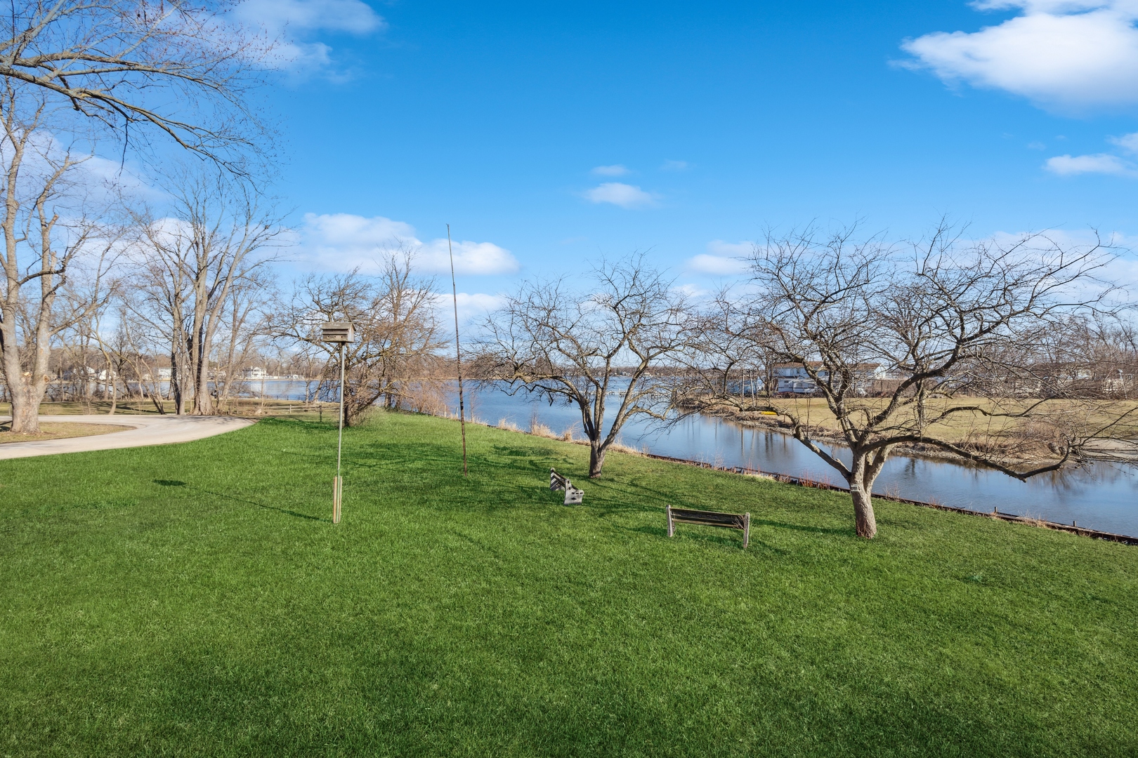 26075 Riverview Drive Antioch, IL 60002 - Photo 29 of 41 a green field with lots of trees